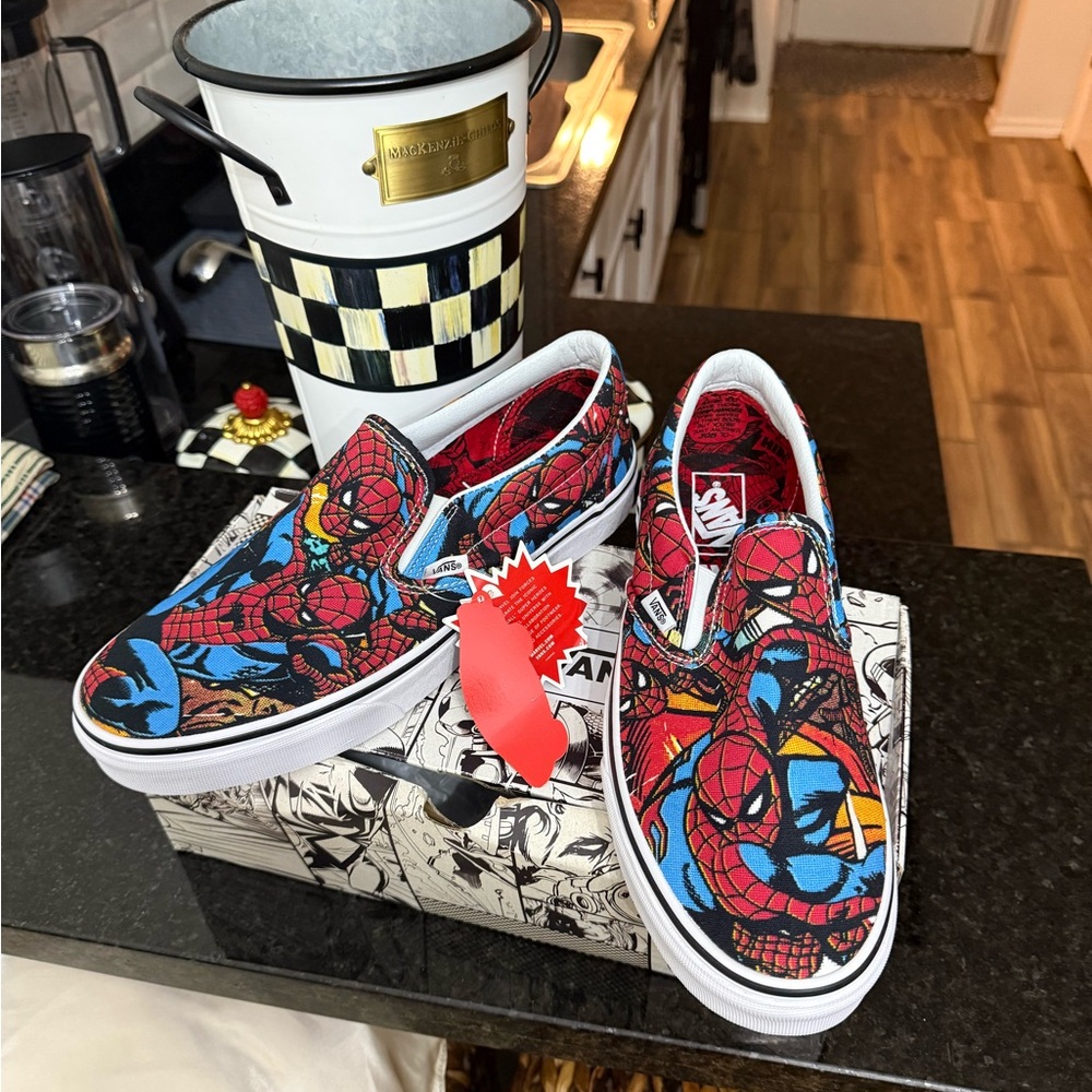 Vans Slip-On Sneakers with Spider-Man Comic Print in Red Blue Black